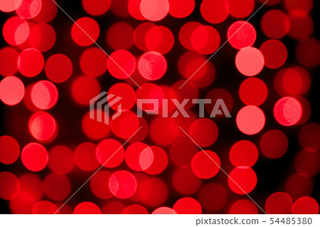 Unfocused abstract red bokeh on black background. 54485380