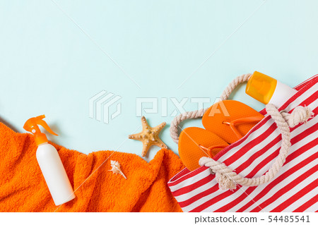 Summer bag background with copy space. Flat lay Summer bag background with copy space. Flat lay 54485541