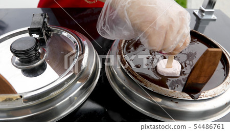 ice cream dipped in chocolate 54486761