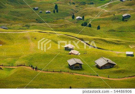 road and houses, green fields at Dolomites mountains, Italy road and houses, green fields at Dolomites mountains, Italy 54486906