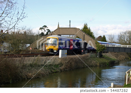 Canal, railway and train Canal, railway and train 54487282