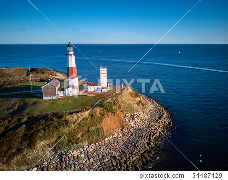Montauk Lighthouse and beach aerial shot Montauk Lighthouse and beach aerial shot 54487429