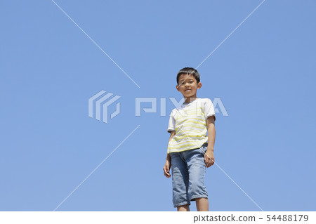 Smile and blue sky of elementary school student (4th grader) Smile and blue sky of elementary school student (4th grader) 54488179