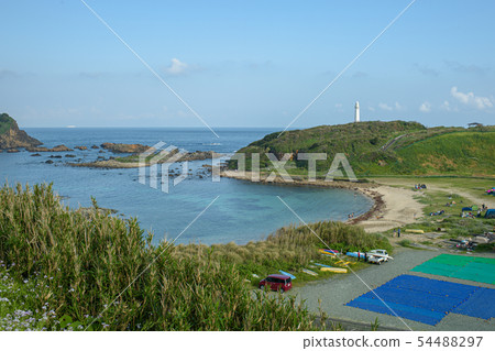 Beach with lighthouse 54488297
