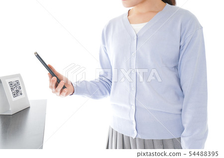 Young woman doing cashless payment Young woman doing cashless payment 54488395