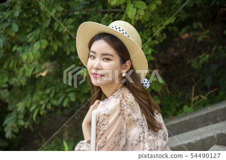 A woman reading 54490127