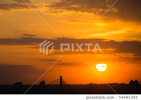 Dramatic sunset with orange sky and dark Dramatic sunset with orange sky and dark 54491393