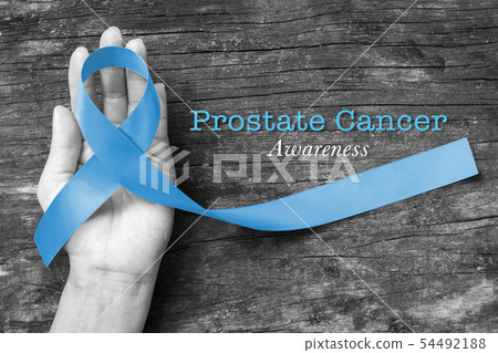 Blue ribbon symbolic of prostate cancer awareness Blue ribbon symbolic of prostate cancer awareness 54492188