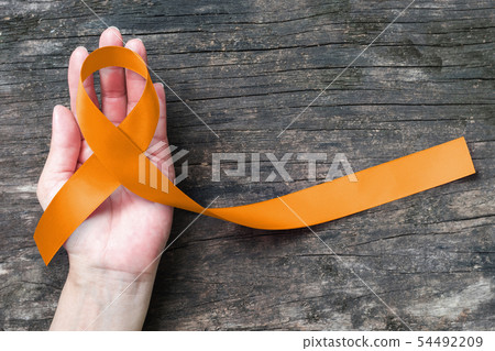Amber color ribbon for raising awareness campaign  54492209