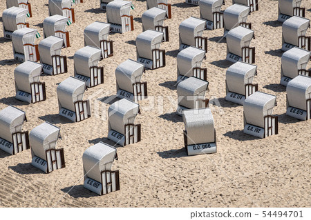 Beach chairs on the Baltic Sea coast in Goehren, 54494701