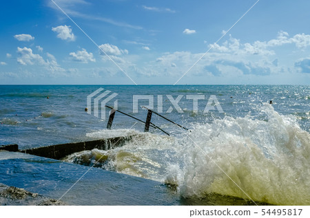 Splashing wave on the Black sea. 54495817