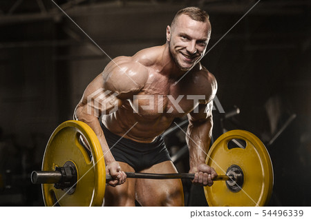 Strong athletic men pumping up back muscles workout fitness Stock