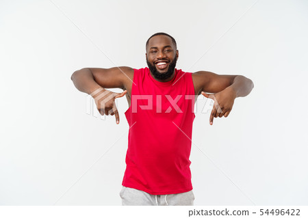 Young african american sport man pointing finger with surprised, feels successful and prosperous 54496422