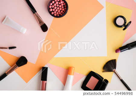 Makeup cosmetic products color background flat lay Makeup cosmetic products color background flat lay 54496998