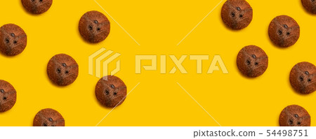 Tropical abstract coconut pattern on yellow 54498751
