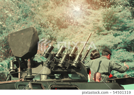 army tank moving evacuate child escape in war 54501319