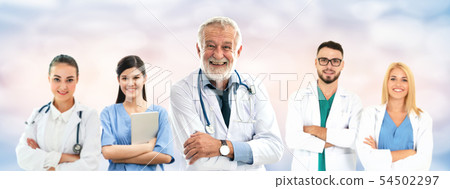 Doctor working in hospital with other doctors. Doctor working in hospital with other doctors. 54502297