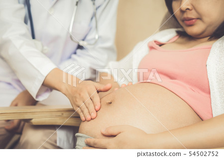 Pregnant Woman and Gynecologist Doctor at Hospital 54502752