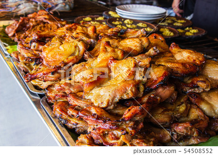 Close-up Grilled chicken on aluminum tray. Close-up Grilled chicken on aluminum tray. 54508552