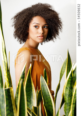 Portrait of a woman standing indoors 54509832