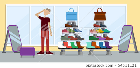 The guy in the Shoe store chooses shoes The guy in the Shoe store chooses shoes 54511121