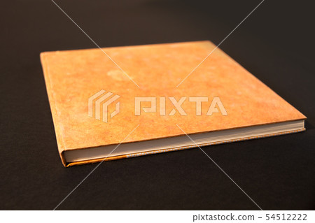Closed blank notebook isolated on black Closed blank notebook isolated on black 54512222