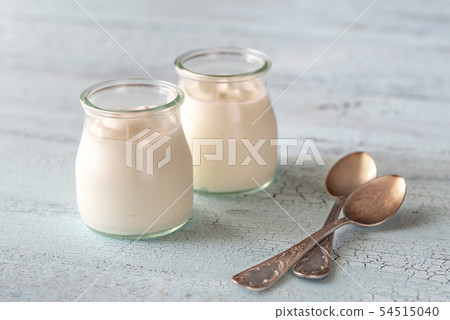 Two jars of Greek yogurt Two jars of Greek yogurt 54515040