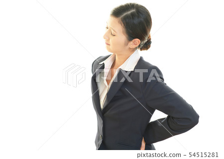 A woman complaining of low back pain 54515281