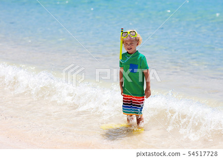 Kids snorkel. Children snorkeling in tropical sea. Kids snorkel. Children snorkeling in tropical sea. 54517728