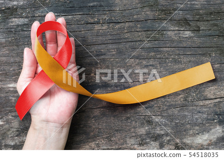 Red Gold ribbon awareness concept help campaign Red Gold ribbon awareness concept help campaign 54518035