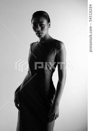 Fashion Asian Woman Tan skin black hair eyes Fashion Asian Woman Tan skin black hair eyes 54518284