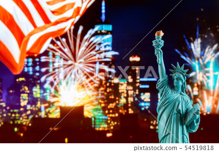 Manhattan skyline at night and Statue of Liberty. Manhattan skyline at night and Statue of Liberty. 54519818