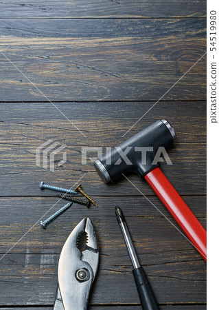 DIY tools placed on a wooden board DIY tools placed on a wooden board 54519980
