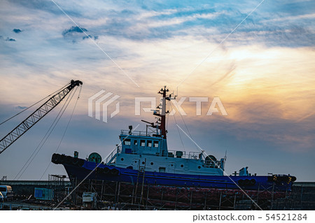 Harbor at dusk maintenance ship 54521284