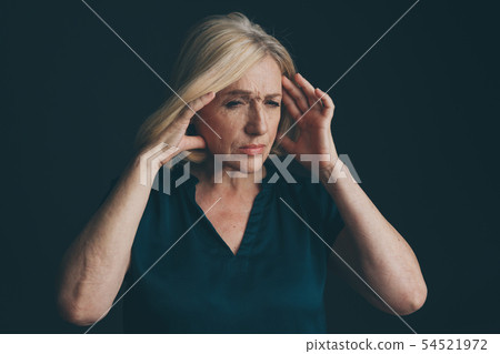Woman in stress having headache. Migraine concept. 54521972