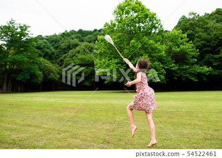 A girl with insect repellent 54522461