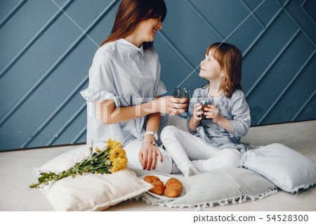 Mother with little child at home 54528300