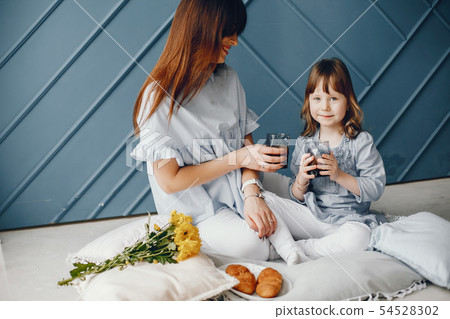 Mother with little child at home 54528302
