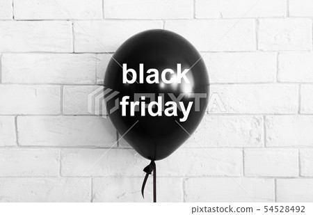 Balloon with text on white bricks background 54528492
