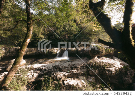 Mountain river waterfall view Mountain river waterfall view 54529422