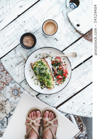 Food blogger making shot of healthy vegan 54529484