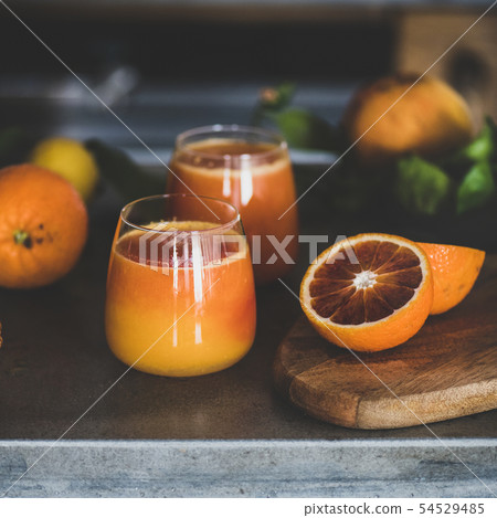 Glasses of fresh blood orange juice or smoothie Glasses of fresh blood orange juice or smoothie 54529485