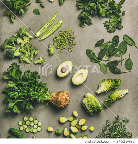 Flat-lay of whole and cut vegetables and herbs Flat-lay of whole and cut vegetables and herbs 54529486