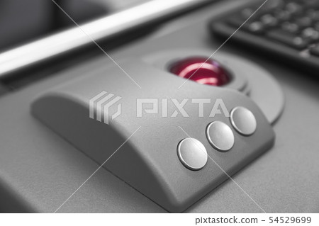 Red trackball, close up photo 54529699