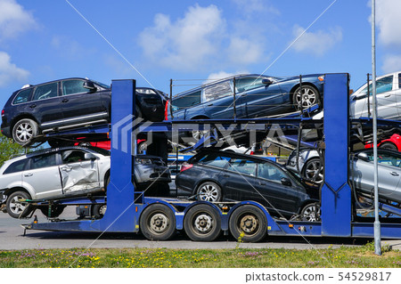 Car carrier trailer with used cars for sale on