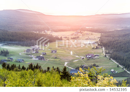 Jizerka village at sunset time. View from Bukovec Mountain, Jizera Mountains, Czech Republic 54532395