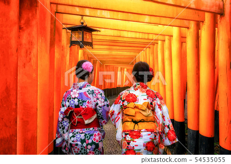 Traveler in Fushimi Inari Shrine, Kyoto, Japan Traveler in Fushimi Inari Shrine, Kyoto, Japan 54535055