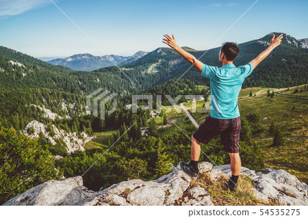 Man traveler hiking across Croatia landscape. Man traveler hiking across Croatia landscape. 54535275