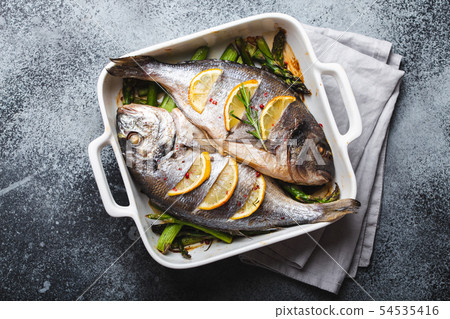 Fish dorado baked with asparagus Fish dorado baked with asparagus 54535416