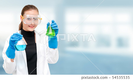 Scientist or chemist holds test tube in laboratory Scientist or chemist holds test tube in laboratory 54535535